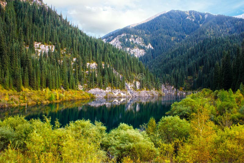 Kaindy Lake in Tien Shan mountain stock images Kaindy Lake in Tien Shan mountain stock images