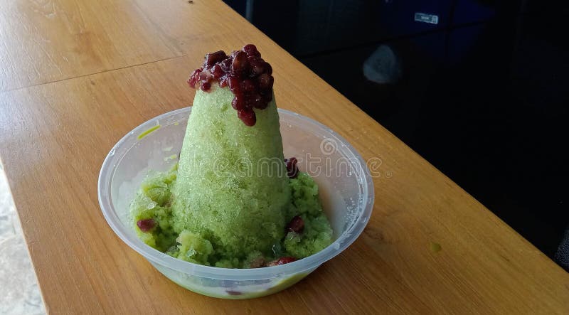 Kakigori Is Japanese Shaved Ice Dessert With Red Beans And Sweet Sauce On Ice Cream