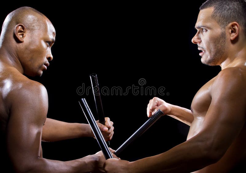 Two Men Sparring With Filipino Stick Fighting Martial Arts Stock Photo,  Picture and Royalty Free Image. Image 38725338.