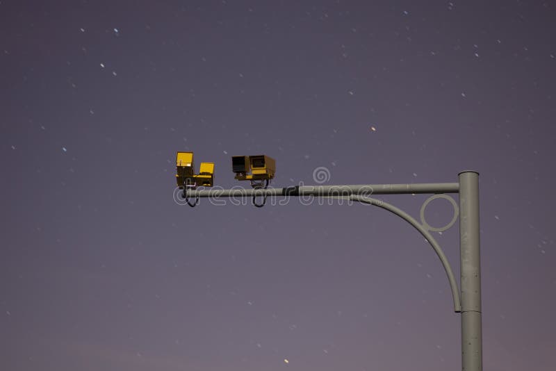 Security / road traffic camera at night aganst starry sky. Security / road traffic camera at night aganst starry sky