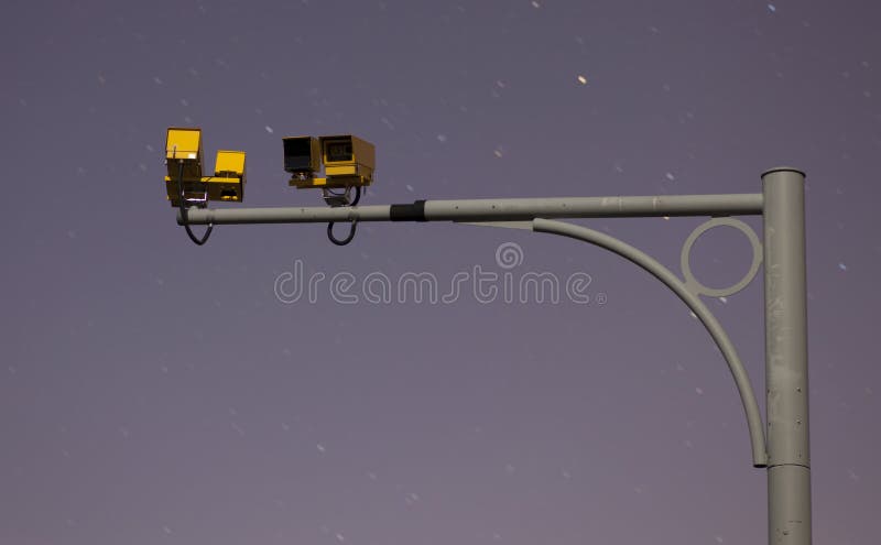 Security / road traffic camera at night aganst starry sky. Security / road traffic camera at night aganst starry sky