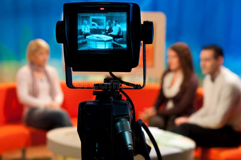 Video camera viewfinder - recording show in TV studio - focus on camera. Video camera viewfinder - recording show in TV studio - focus on camera