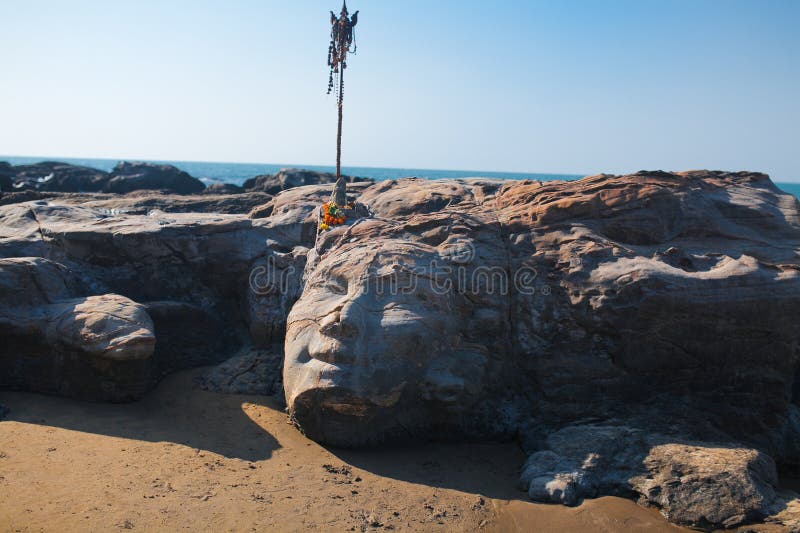 Kamienny Shiva stawia czoło na Vagator plaży Goa zdjęcie stock Kamienny Shiva stawia czoło na Vagator plaży Goa zdjęcie stock