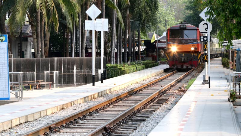 Kanchanaburi, Thailand - Mar 25, 2019. Train arriving to River Kwai Bridge station in Kanchanaburi Province, west Thailand.