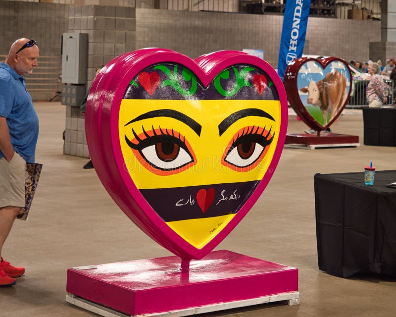 Kansas City KC Heart - Hijab Eyes Theme. Kansas City, Missouri - April 15, 2023: Parade of Hearts KC Unveiling Event at the American Royal - An opportunity to