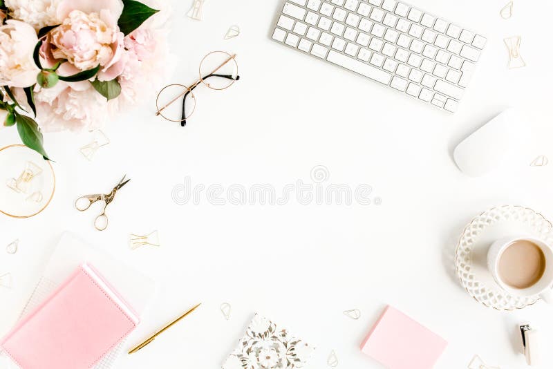 Flat lay women`s office desk. Female workspace with computer, pink peonies bouquet, accessories on white background. Top view feminine background. High quality photo. Flat lay women`s office desk. Female workspace with computer, pink peonies bouquet, accessories on white background. Top view feminine background. High quality photo