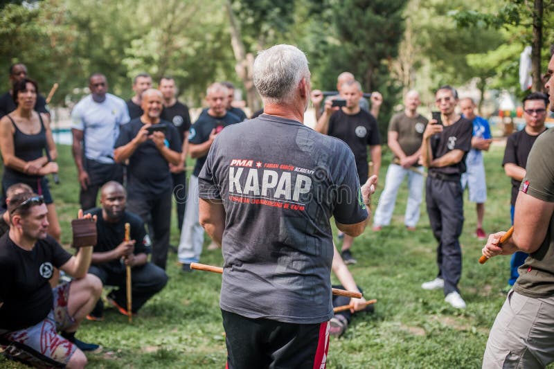 Filipino Martial Arts Instructor Demonstrates Stick Fighting Techniques  Stock Photo - Image of astig, outdoor: 109278684