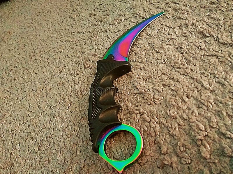 https://thumbs.dreamstime.com/b/karambit-fade-colorfull-sharp-knife-84351889.jpg