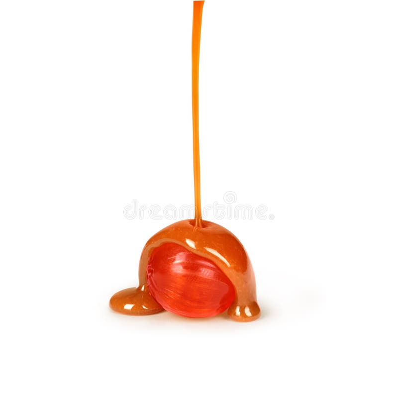Karamelsuikergoed en karamelsaus het gieten royalty-vrije stock foto Karamelsuikergoed en karamelsaus het gieten royalty-vrije stock foto