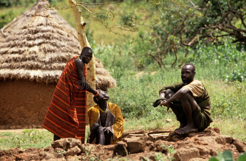 Karamojong men in Uganda stock photography
