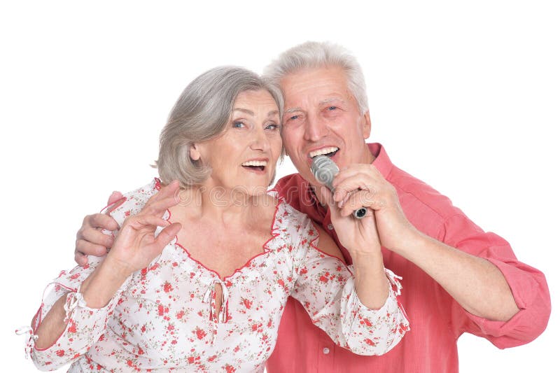 Karaoke supérieur de chant de couples photo stock Karaoke supérieur de chant de couples photo stock