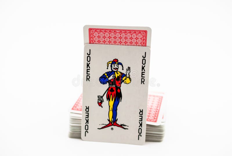 Karciany joker obok pokładu karty obrazy royalty free