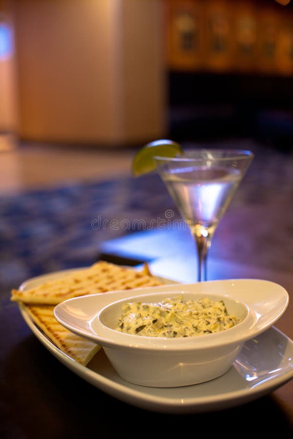 Artichoke Cheese Dip Appetizer with Martini. Artichoke Cheese Dip Appetizer with Martini