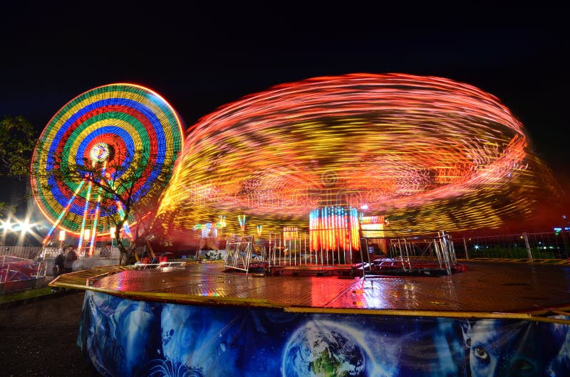 Swing ride at fair carnival at night. Swing ride at fair carnival at night