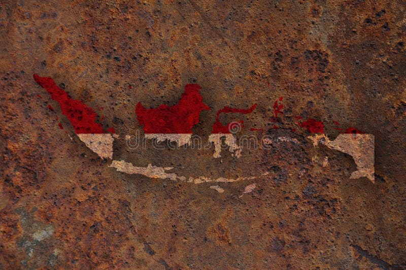 Kartlägga och flaggan av Indonesien på rostig metall arkivfoton Kartlägga och flaggan av Indonesien på rostig metall arkivfoton