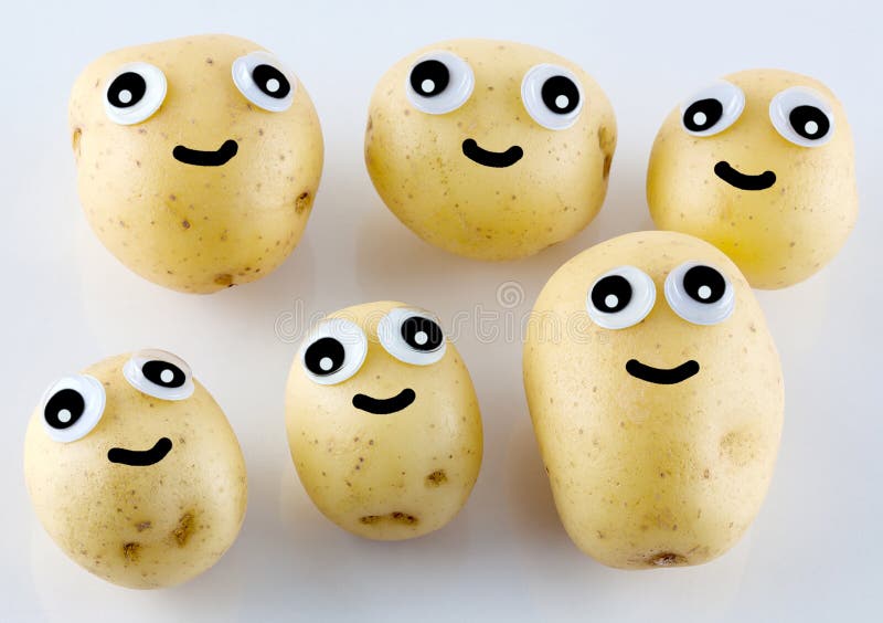 Kartoffelleute mit Augen und Lächeln lizenzfreie stockfotos Kartoffelleute mit Augen und Lächeln lizenzfreie stockfotos