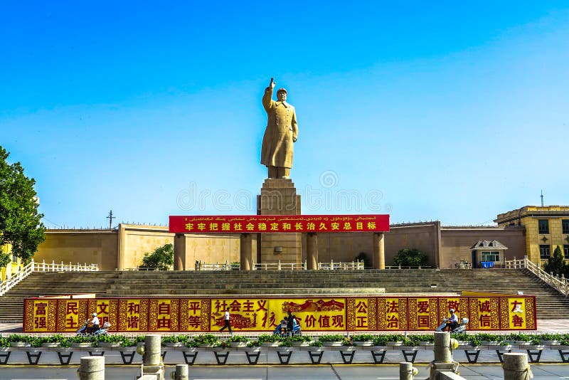 Kashgar People`s Park Square Mao Zedong Statue with Chinese Communist Parole. Kashgar People`s Park Square Mao Zedong Statue with Chinese Communist Parole