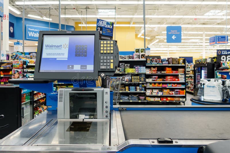 Kassalåda på en Walmart supermarket royaltyfri foto Kassalåda på en Walmart supermarket royaltyfri foto