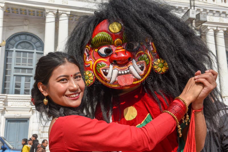 Woman with a traditional mask at Durban square in Kathmandu on Nepal