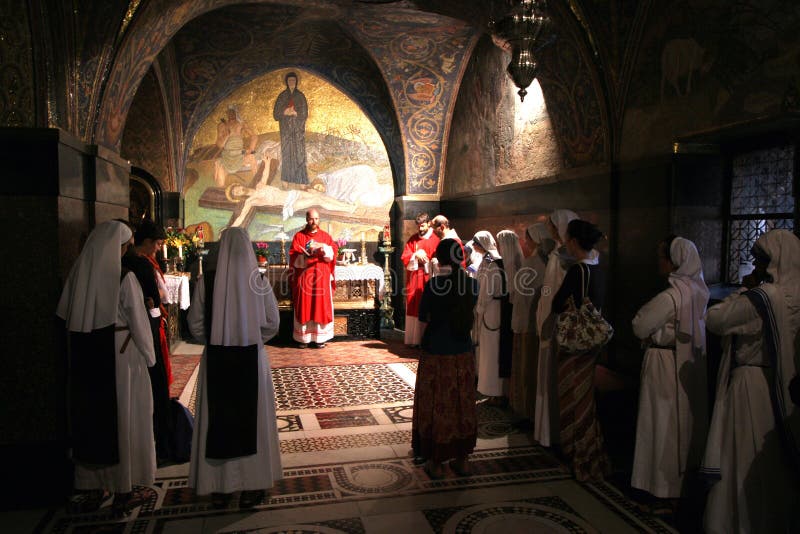 Catholic Mass at the 11th Stations of the Cross in the Church of the Holy Sepulchre. Jerusalem. Catholic Mass at the 11th Stations of the Cross in the Church of the Holy Sepulchre. Jerusalem.