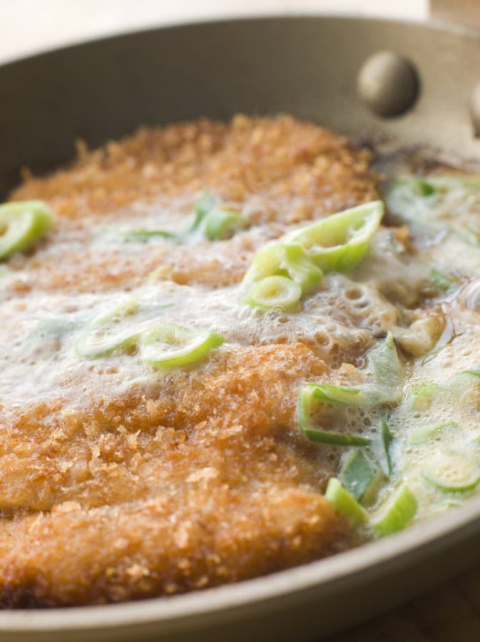 Close up of Katsu-Doncooking in A Japanese Frying Pan. Frying pan stock images, royalty-free photos and pictures