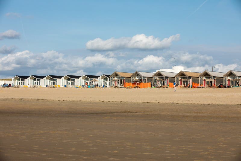 Row white beach houses at the Dutch coast in Katwijk, Netherlands