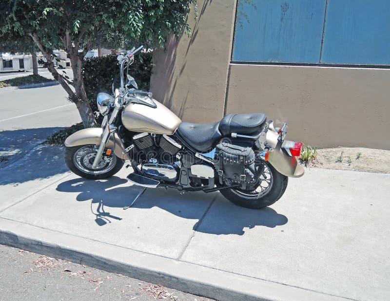 This is a Kawasaki Vulcan Classic motorcycle that is powered by a V-Twin engine and is designed for street riding. This is a Kawasaki Vulcan Classic motorcycle that is powered by a V-Twin engine and is designed for street riding.