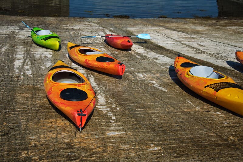 Kayak canoe on stone ramp outside royalty free stock images