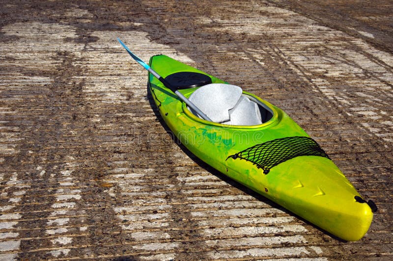 Kayak canoe on stone ramp outside royalty free stock image