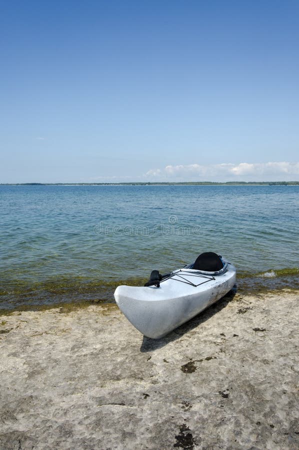Kayak on the Shoreline stock photo. Image of wilderness 46660440
