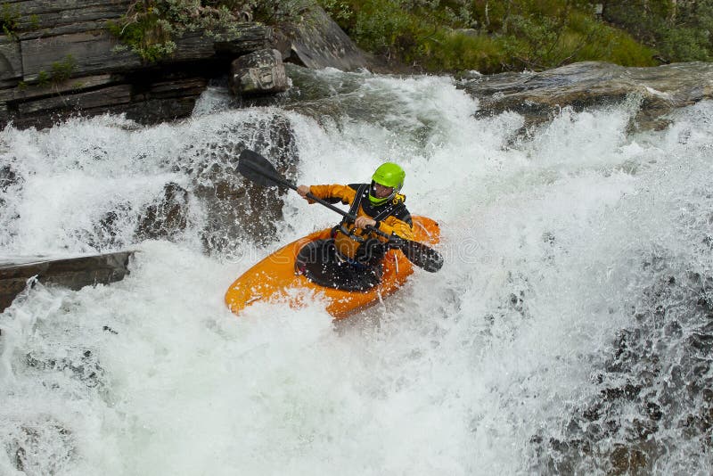 Kayaker in the waterfall