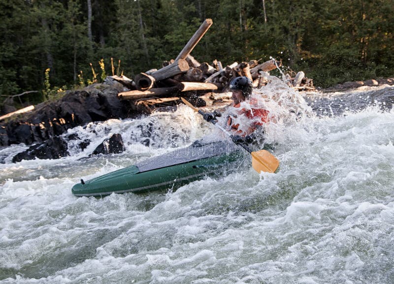 Kayaker in whitewater