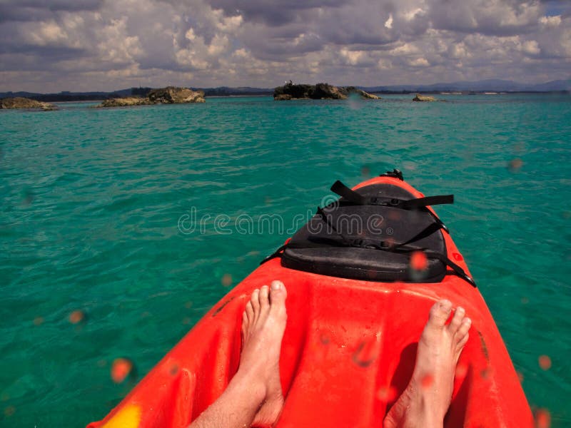 Sea Kayaking to the Outer Rocks in Byron Bay, Australia. Sea Kayaking to the Outer Rocks in Byron Bay, Australia