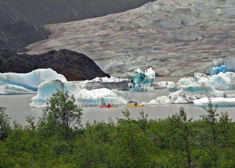 Kayaking Among the Glaciers royalty free stock image