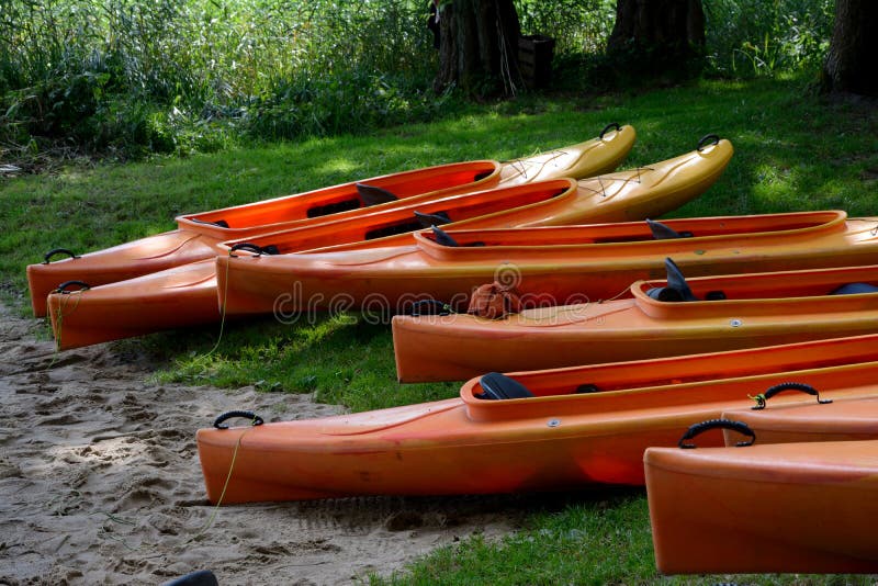 Kayaks on lake shore royalty free stock photography Kayaks on lake shore royalty free stock photography