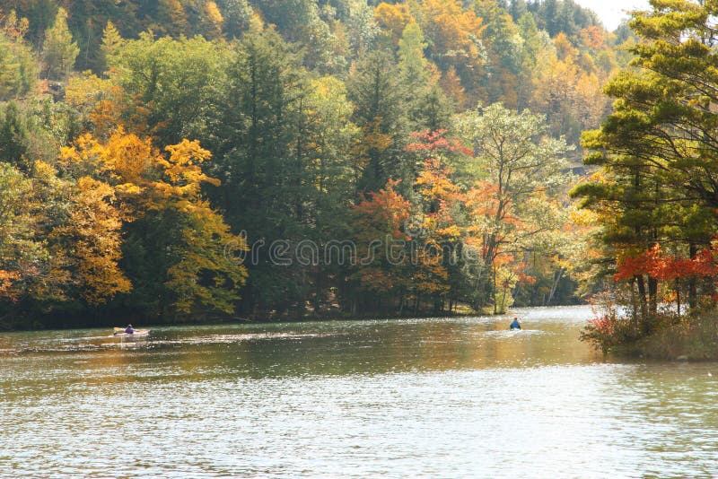 Kayaks on mountain lake royalty free stock images