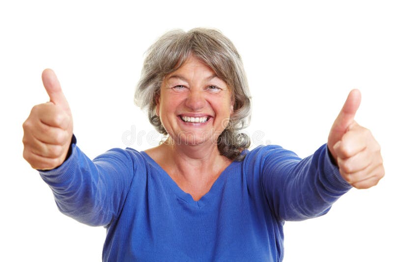 An happy senior woman showing her two thumbs up. An happy senior woman showing her two thumbs up