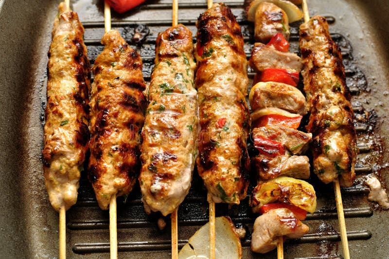 Lamb and beef kebab on the grill. Roasted skewer grill stock images, royalty-free photos and pictures
