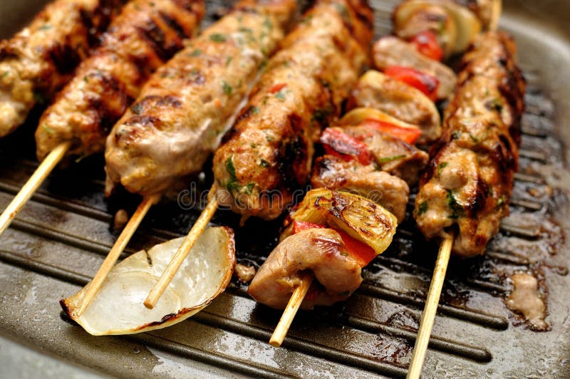 Lamb and beef kebab on the grill. Roasted skewer grill stock images, royalty-free photos and pictures