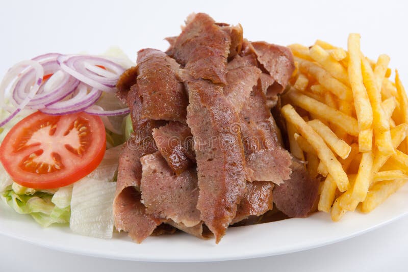 Kebab met frietjes stock afbeeldingen
