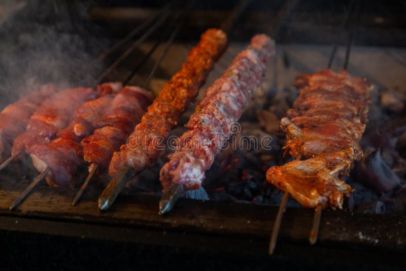 Kebabs cooking on the gril stock photo. Image of green - 2730350