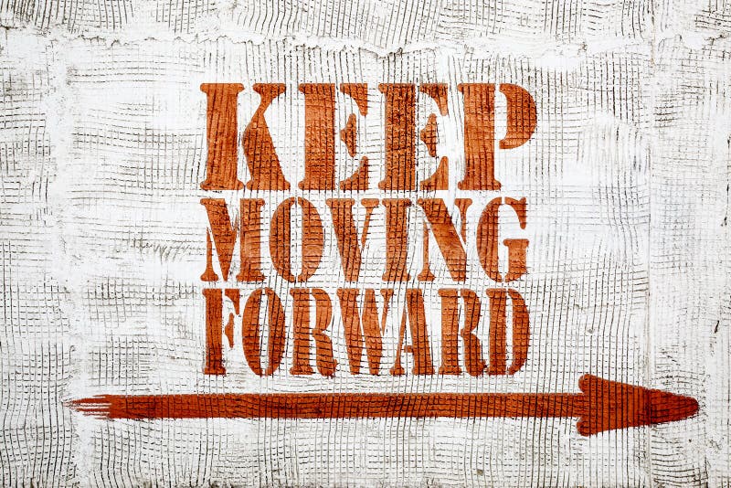 Keep che muove in avanti - i graffiti sulla parete dello stucco immagini stock libere da diritti Keep che muove in avanti - i graffiti sulla parete dello stucco immagini stock libere da diritti