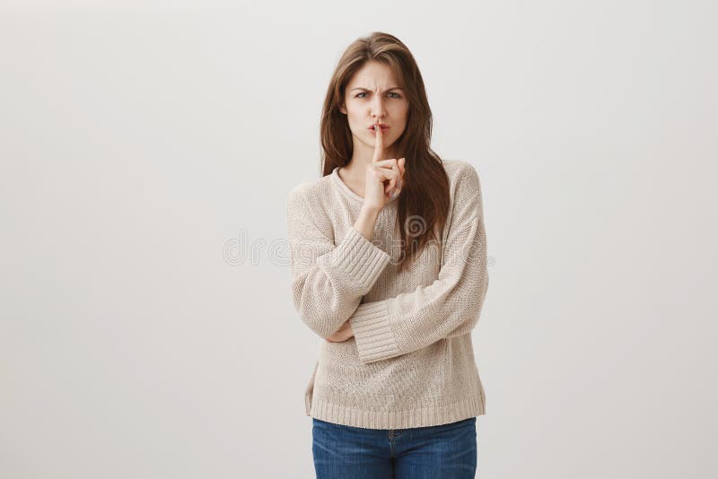 Keep it down, why you have to be so disgusting. Studio shot of angry irritated caucasian female frowning and being in