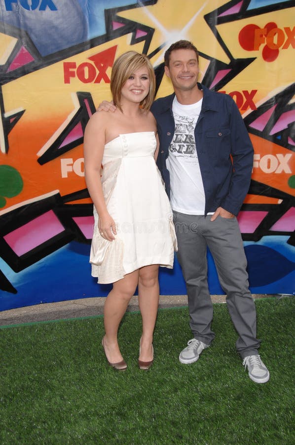 Kelly Clarkson & Ryan Seacrest at the 2007 Teen Choice Awards at the Gibson Amphitheatre, Universal City, Hollywood. August 26, 2007 Los Angeles, CA Picture: Paul Smith / Featureflash. Kelly Clarkson & Ryan Seacrest at the 2007 Teen Choice Awards at the Gibson Amphitheatre, Universal City, Hollywood. August 26, 2007 Los Angeles, CA Picture: Paul Smith / Featureflash