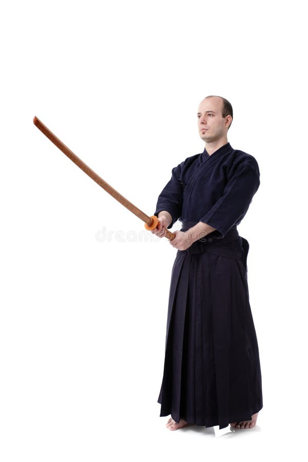 A Man, In A Black Kimono Is Practicing Martial Arts Technique With A Long  Bamboo Fighting Stick. Stock Photo, Picture and Royalty Free Image. Image  91980191.