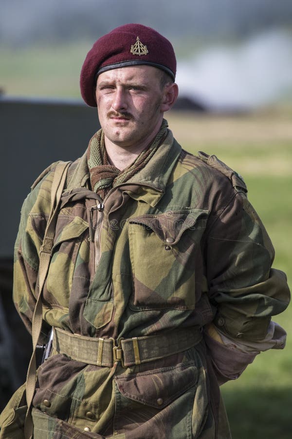 KENT, UK - AUGUST 28TH 2017: Actor posing as a British soldier from the 2nd World War, at the Military Odyssey Re-enactment event in Detling, Kent, on 28th August 2017. KENT, UK - AUGUST 28TH 2017: Actor posing as a British soldier from the 2nd World War, at the Military Odyssey Re-enactment event in Detling, Kent, on 28th August 2017.