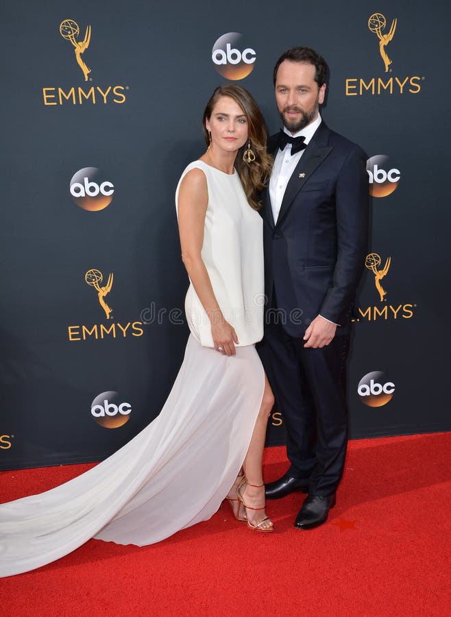 LOS ANGELES, CA. September 18, 2016: Actress Keri Russell & actor Matthew Rhys at the 68th Primetime Emmy Awards at the Microsoft Theatre L.A. Live. LOS ANGELES, CA. September 18, 2016: Actress Keri Russell & actor Matthew Rhys at the 68th Primetime Emmy Awards at the Microsoft Theatre L.A. Live