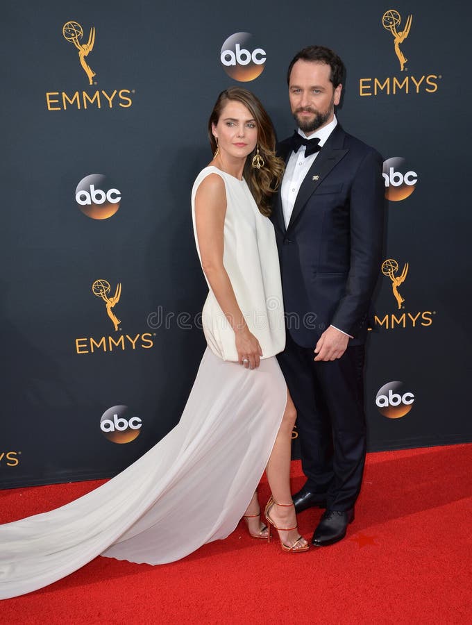 LOS ANGELES, CA. September 18, 2016: Actress Keri Russell & actor Matthew Rhys at the 68th Primetime Emmy Awards at the Microsoft Theatre L.A. Live. LOS ANGELES, CA. September 18, 2016: Actress Keri Russell & actor Matthew Rhys at the 68th Primetime Emmy Awards at the Microsoft Theatre L.A. Live