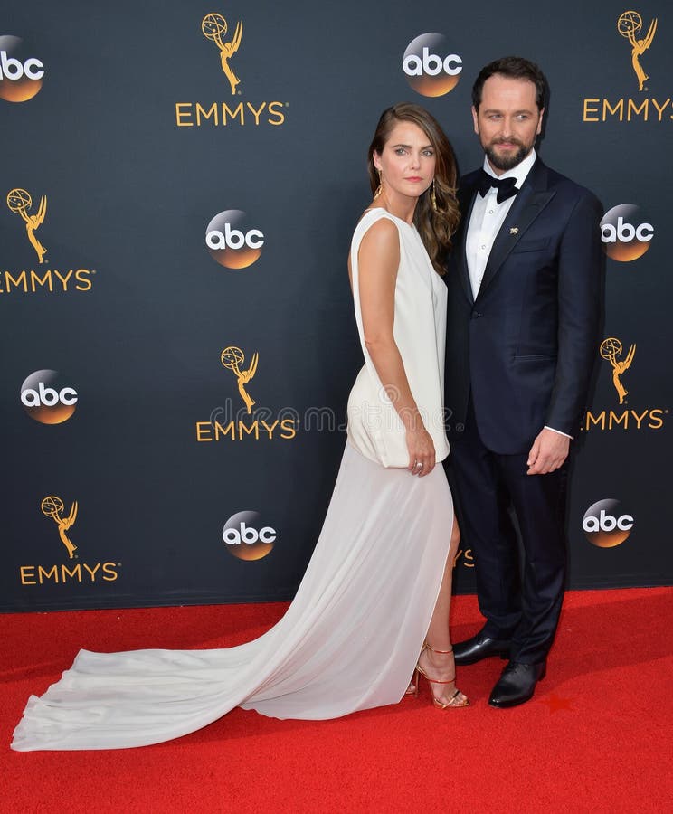 LOS ANGELES, CA. September 18, 2016: Actress Keri Russell & actor Matthew Rhys at the 68th Primetime Emmy Awards at the Microsoft Theatre L.A. Live. LOS ANGELES, CA. September 18, 2016: Actress Keri Russell & actor Matthew Rhys at the 68th Primetime Emmy Awards at the Microsoft Theatre L.A. Live