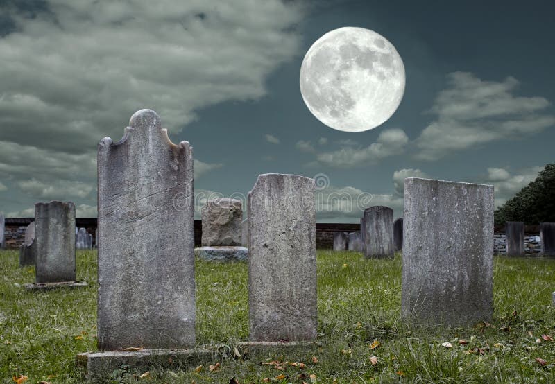 An old graveyard in the light of the full moon. An old graveyard in the light of the full moon.